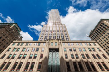 NEW YORK - MAY 19, 2024: Striking upward view of the Empire State Building, one of New York City most iconic landmarks, located in Midtown Manhattan.