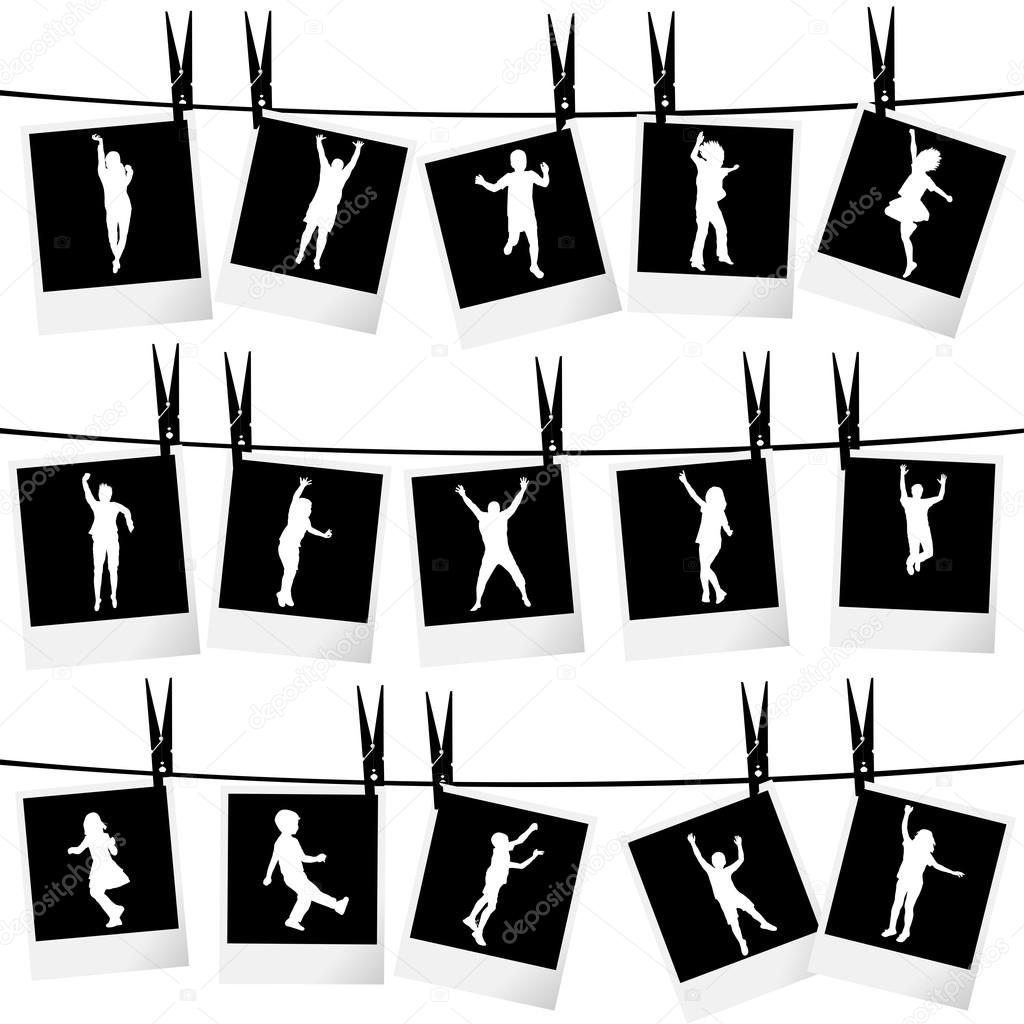 Collection of photo frames hanging on rope with children silhoue