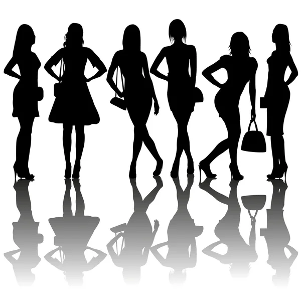 Fashion silhouettes of women — Stock Vector