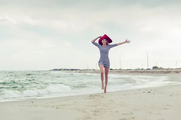 Beautiful Sexy Blonde Girl Striped Dress Red Hat Runs Beach — Stock Photo, Image