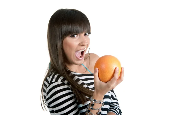 Beautiful brunette girl with grapefruit — Stock Photo, Image