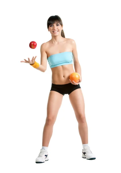 Fitness girl in sportswear with fruits — Stock Photo, Image