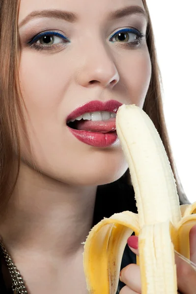 Fille manger une banane — Photo