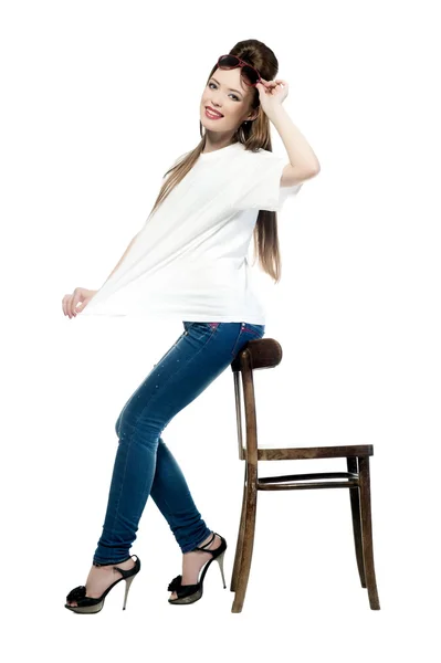 Sexy girl in jeans and a T-shirt — Stock Photo, Image