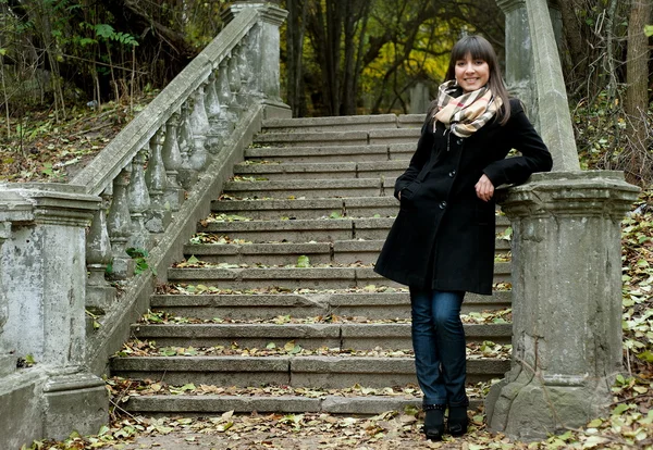 Girl posing on stairs — Stock Photo, Image