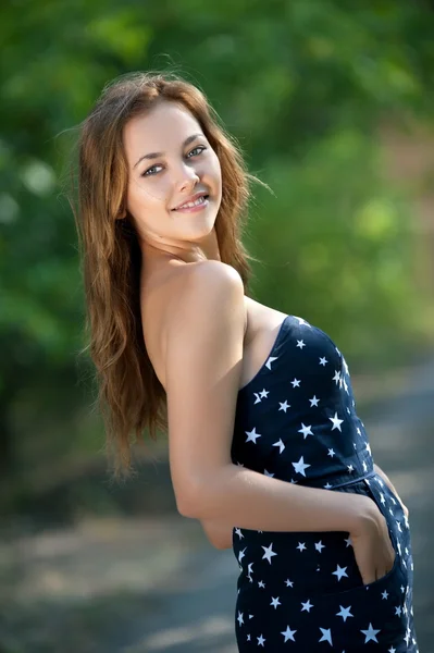 Girl in short starry dress — Stock Photo, Image