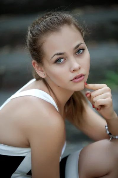 Girl in short black dress — Stock Photo, Image