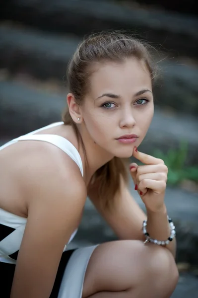 Girl in short black dress — Stock Photo, Image