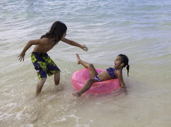 Brother scaring his sister with a crab — Stock Photo, Image