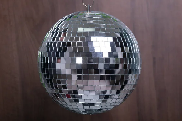 Shining Disco Ball Dance Music Event Equipment Wood Background — Stockfoto