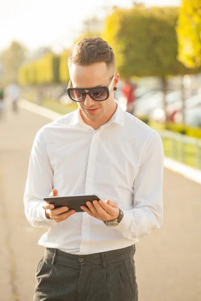 Man with mobile phone in hands — Stock Photo, Image