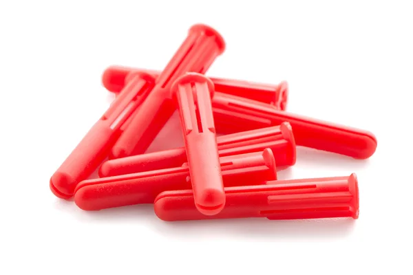 Red plastic dowels — Stock Photo, Image