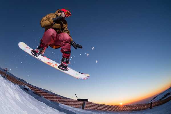 Snowboarding in the mountains