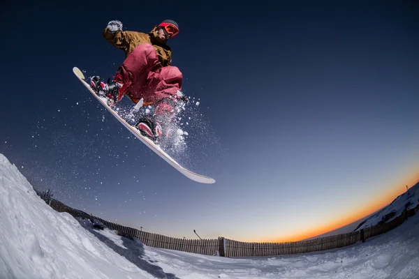 Snowboarding in the mountains — Stock Photo, Image