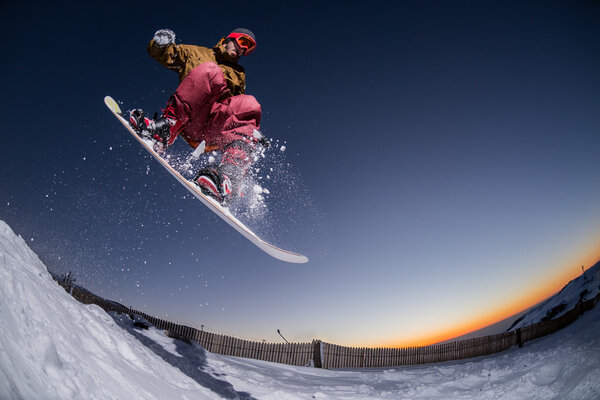 Snowboarding in the mountains