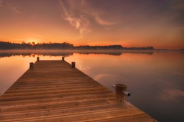 Sunrise on lake clipart