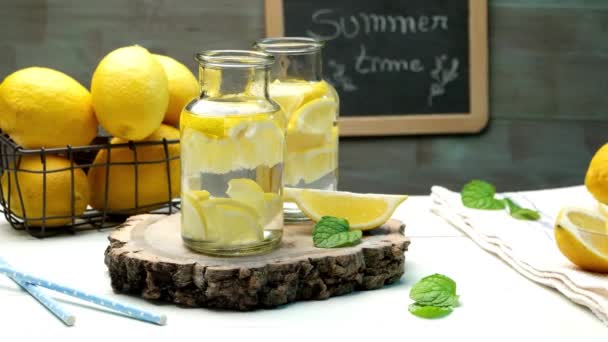 Lemon and lime slices in jars — Stock Video