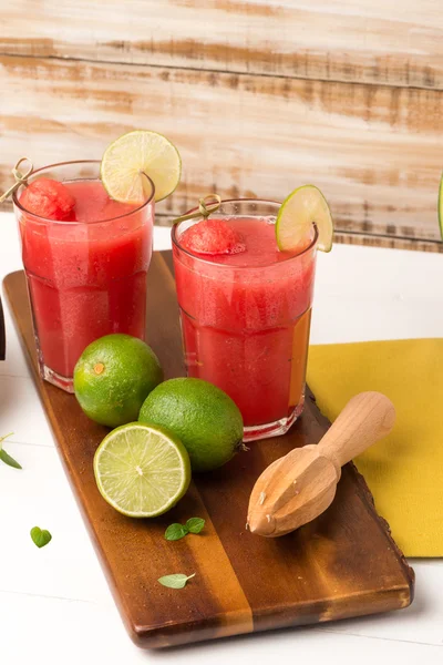 Watermelon smoothies on wooden table — Stock Photo, Image