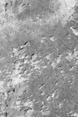 Kumda karmaşık desenler oluşmuş, gri manzara fotoğrafı..