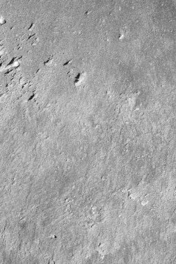 Kumda karmaşık desenler oluşmuş, gri manzara fotoğrafı..