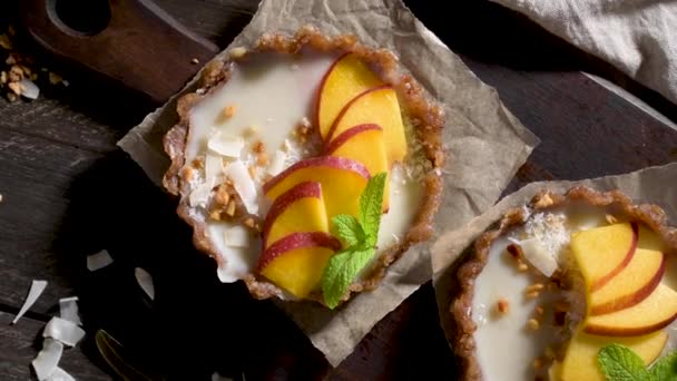 Peach Vegan Tarts Grated Coconut Crunchy Peanuts Fruit Cake Date — Stock Video