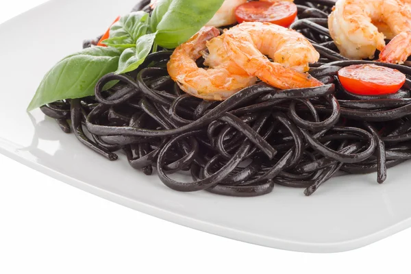 Black spaghetti with shrimps — Stock Photo, Image