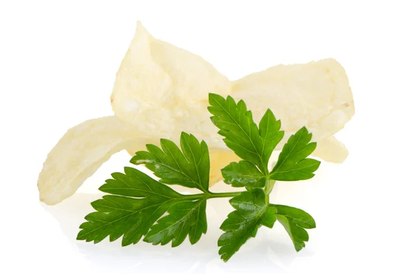 Potato chips and parsley — Stock Photo, Image