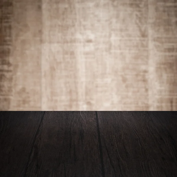 Table with wooden wall — Stock Photo, Image