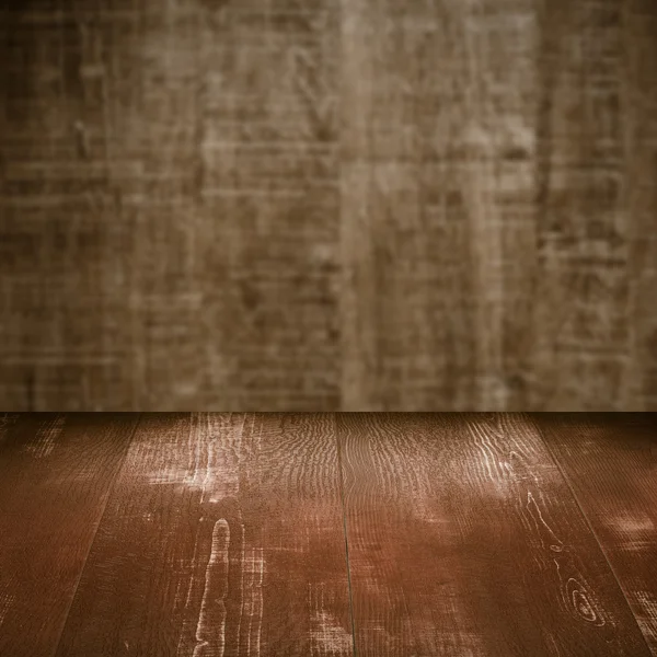 Mesa con pared de madera — Foto de Stock