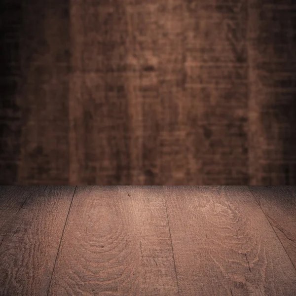 Table with wooden wall — Stock Photo, Image