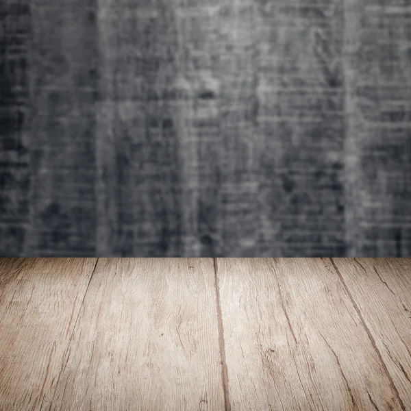 Table with wooden wall — Stock Photo, Image