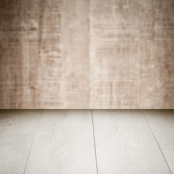 Mesa con pared de madera — Foto de Stock