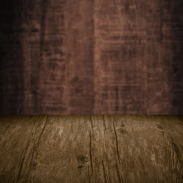 Table with wooden wall Royalty Free Stock Photos