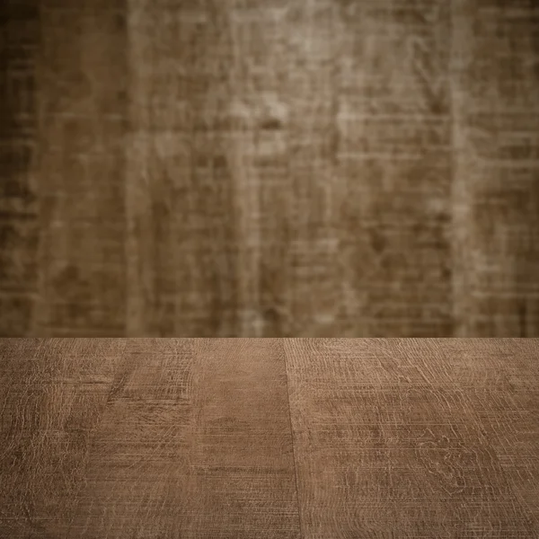 Table with wooden wall — Stock Photo, Image