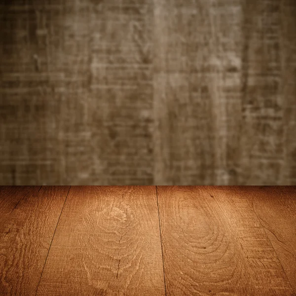 Table with wooden wall Royalty Free Stock Images