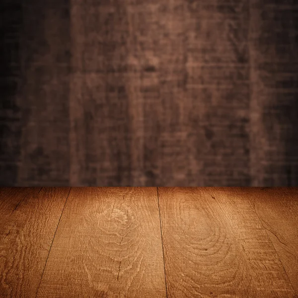 Table with wooden wall Stock Photo