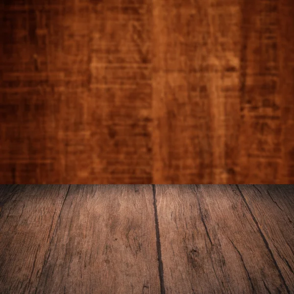 Table with wooden wall — Stock Photo, Image