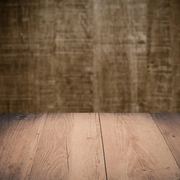 Table with wooden wall — Stock Photo, Image