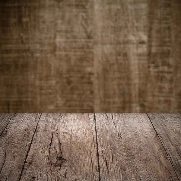 Mesa con pared de madera — Foto de Stock