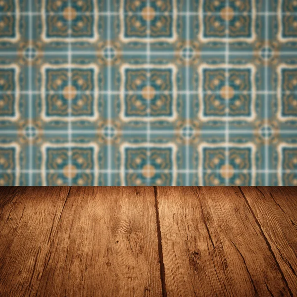 Wood table top and blur ceramic tile  wall — Stock Photo, Image