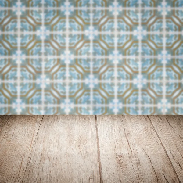 Wood table top and blur ceramic tile  wall — Stock Photo, Image