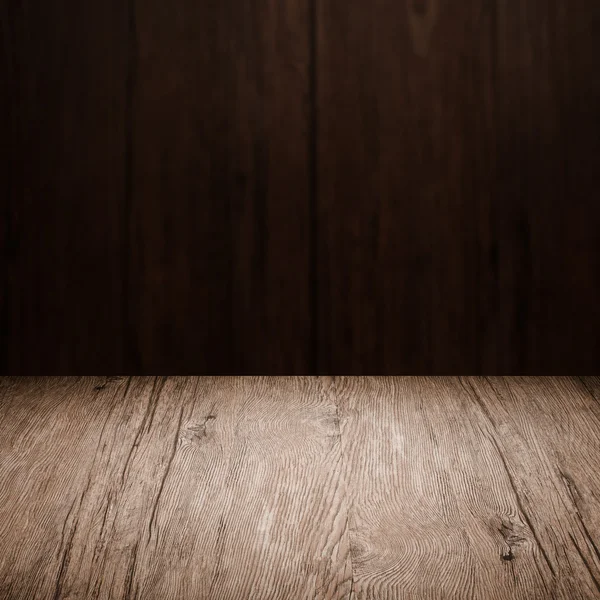 Mesa con pared de madera — Foto de Stock