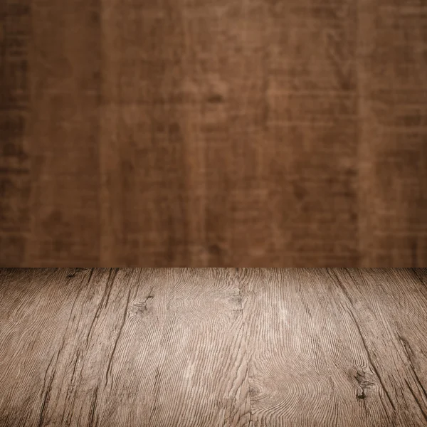 Mesa con pared de madera — Foto de Stock