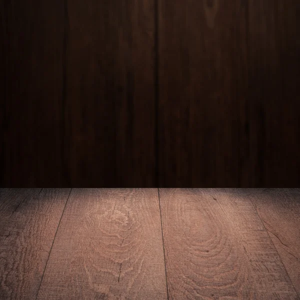 Table with wooden wall — Stock Photo, Image