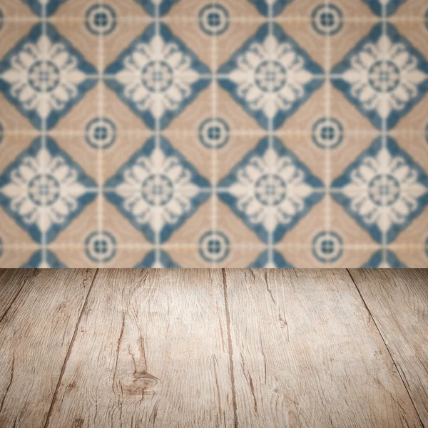 Wood table top and blur   ceramic tile  wall — Stock Photo, Image