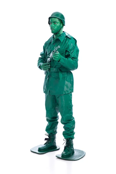Man on a green toy soldier costume — Stock Photo, Image