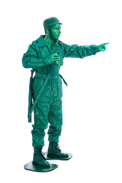 Adam bir yeşil oyuncak asker kostümü — Stok fotoğraf