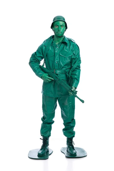 Man on a green toy soldier costume — Stock Photo, Image