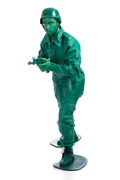 Man on a green toy soldier costume — Stock Photo, Image