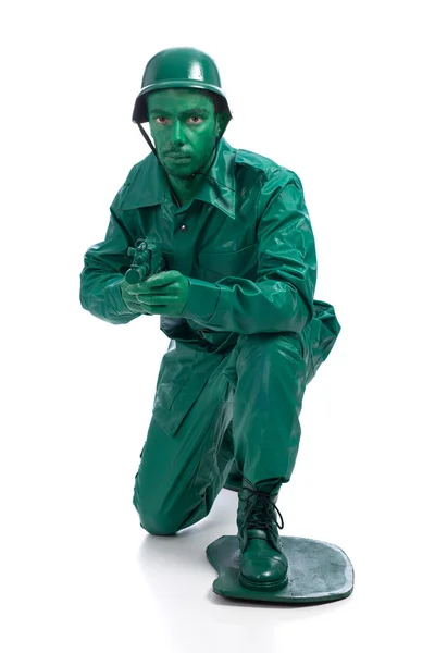 Man on a green toy soldier costume — Stock Photo, Image